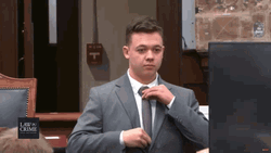 Kyle Rittenhouse Fixing His Tie At The Court GIF
