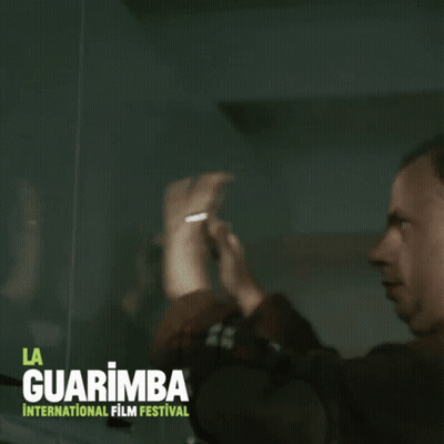 La Guarimba International Film Festival Man Looking Through Window GIF