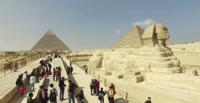 Lab Coat Man With Pyramid And Virusinstaller.com Logo GIF