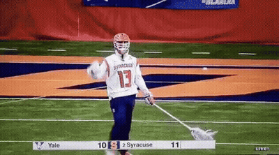 Lacrosse Player Number 13 Holding Stick GIF