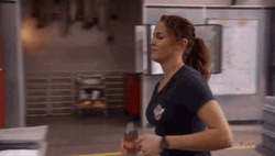 Lady Drinking Water While Walking GIF