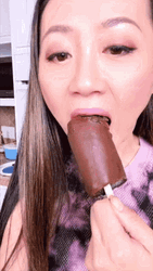 Lady Eating Chocolate Ice Cream Stick Sucking GIF