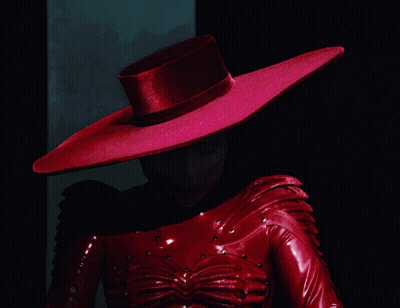 Lady Gaga In Red Dress And Large Hat GIF