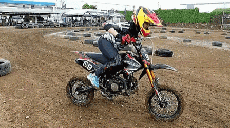 Lady Having Trouble Starting Dirt Bike GIF