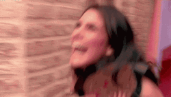 Lady Holding Wrestling Belt GIF