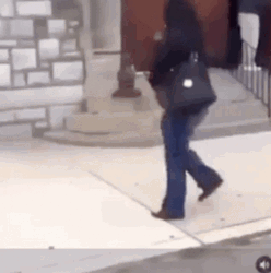 Lady In Black Jacket Falling Down GIF