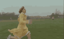 Lady In Dress Running Away At Soccer Field GIF