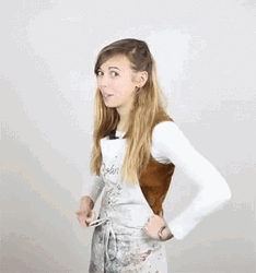 Lady In Jumper Imitating Rim Shot GIF