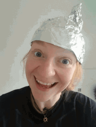 Lady In Tinfoil Hat Making Funny Faces GIF
