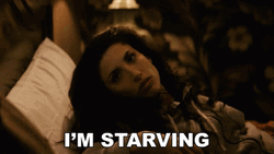 Lady Laying Down Starving GIF