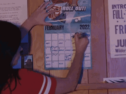 Lady Marking Calendar With X GIF