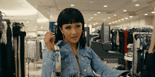 Lady Showing Off Her Card Cha Ching GIF