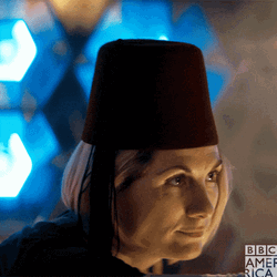 Lady Spinning The Hourglass GIF