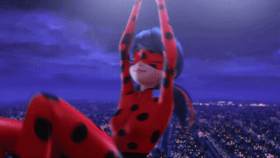 Ladybug Giving Peace Sign In City GIF