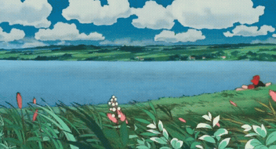 Lake With Person Laying On Shore GIF