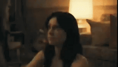 Lamp In Dark Room Next To Doorway GIF