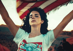 Lana Del Rey Hands Up In The Air GIF