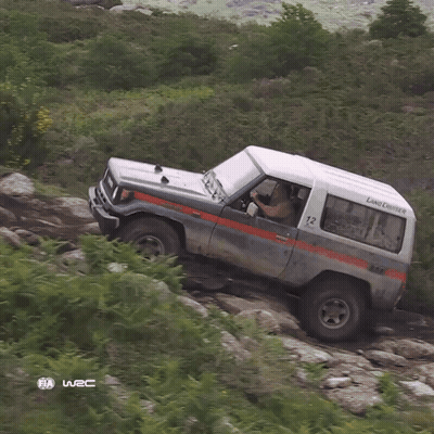 Land Cruiser Parked On Rocky Hillside GIF
