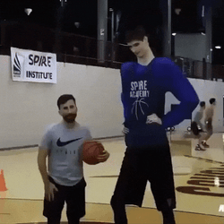 Lanky Man Shoots Ball Easily GIF