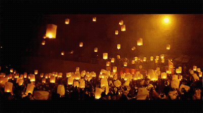 Lanterns Thrown Into Air At Night GIF
