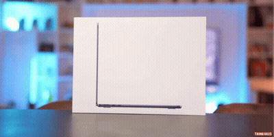 Laptop In White Box With Thinkfiles GIF
