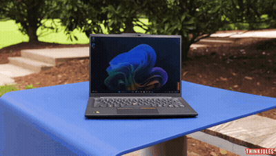 Laptop On Blue Table With Thinkjules GIF