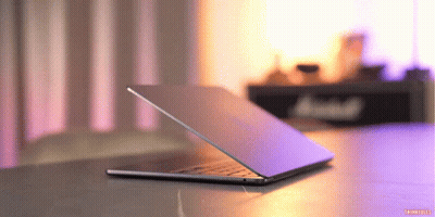 Laptop On Purple Background With Marshall Sign GIF