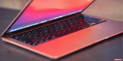 Laptop Open Showing Thinkpads GIF
