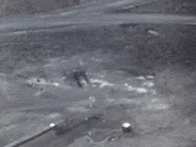 Large Black And White Hole In Ground GIF