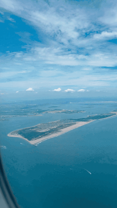 Large Body Of Water With Small Island GIF