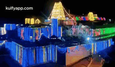 Large Building Lit Up At Night GIF