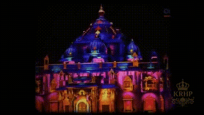 Large Building Lit Up At Night With KRHP GIF