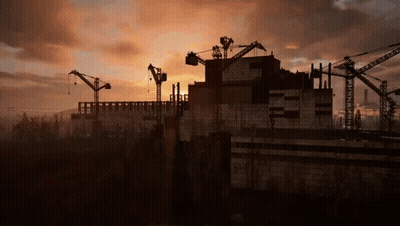 Large Building Under Construction With Cranes At Sunset GIF