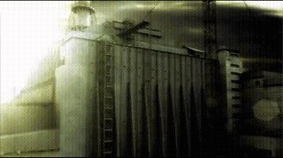 Large Building With Ladder Hanging From Side GIF