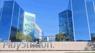Large Building With Playstation Sign GIF