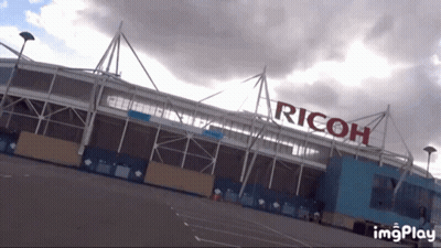 Large Building With Ricoh GIF