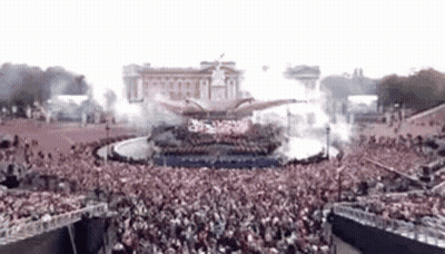 Large Crowd Gathered In Front Of Building GIF