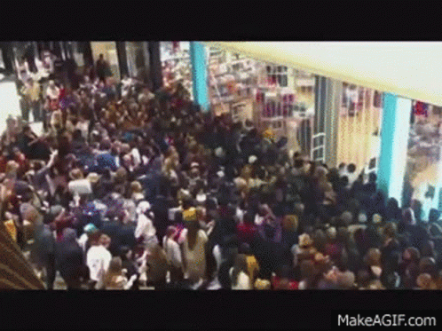 Large Crowd Gathered In Mall GIF