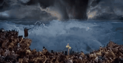 Large Crowd In Field With Cross GIF
