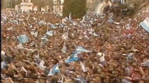 Large Crowd Of People In Stadium With Flags GIF