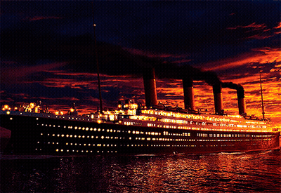 Large Cruise Ship Floating On Water At Sunset GIF