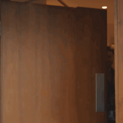 Large Explosion Behind Fence In Parking Lot GIF