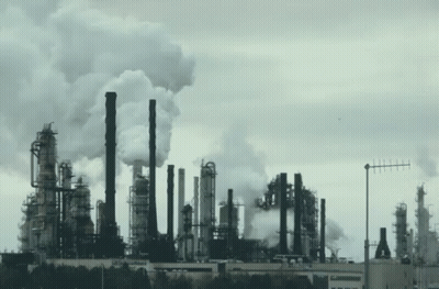 Large Factory With Smoking Chimneys GIF