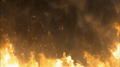 Large Fire Burning In Dark Night Sky GIF