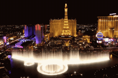 Large Fountain In Front Of Building With Palazzo GIF