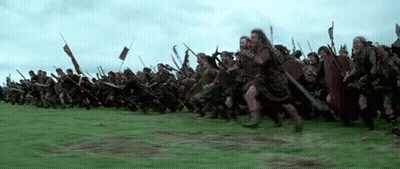 Large Group Of Soldiers Running Through Field GIF