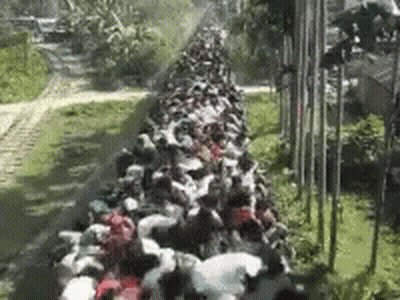 Large Group Sitting On Train GIF