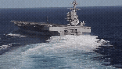 Large Military Ship USS Floating In Ocean GIF
