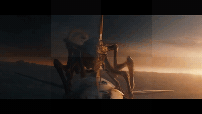 Large Monster Standing On Airplane At Sunset GIF