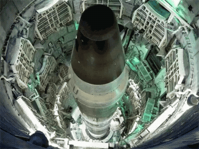 Large Nuclear Rocket Being Built In Large Room GIF